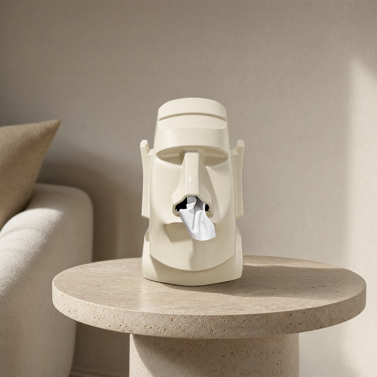 Tissue box stone figure in white on a travertine side table